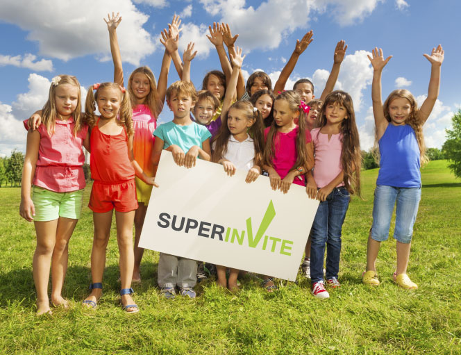 Children holding the SuperInvite banner